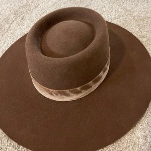Lack of color brown boater hat